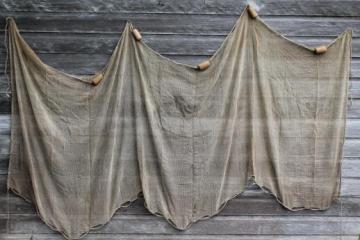 catalog photo of old cotton fishing net w/ wood floats, vintage fish trap net, used but clean