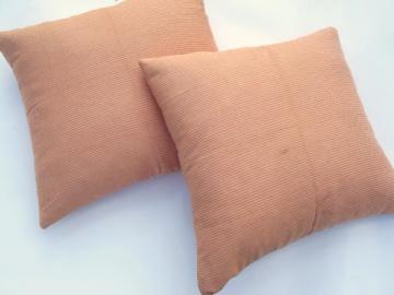 catalog photo of old cotton ticking feather pillows, orange and tan striped vintage fabric