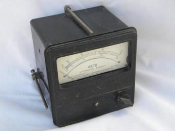 catalog photo of old early electric vintage AC voltmeter w/ panel mount bakelite case