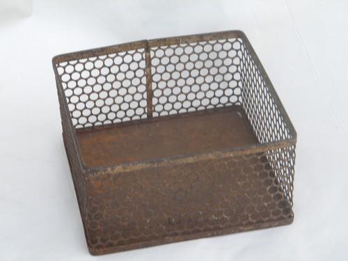 photo of old early industrial machine-age perforated metal desk organizer bin #1