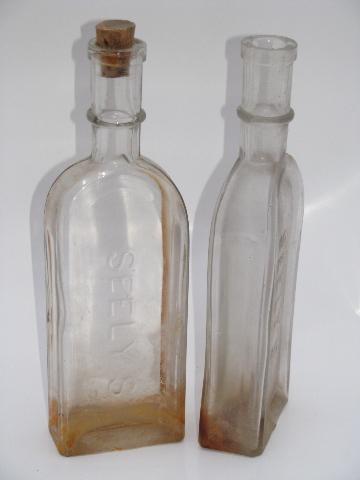 photo of old embossed glass Seely's and Ayer's Sarsaparilla tonic medicine bottles #2