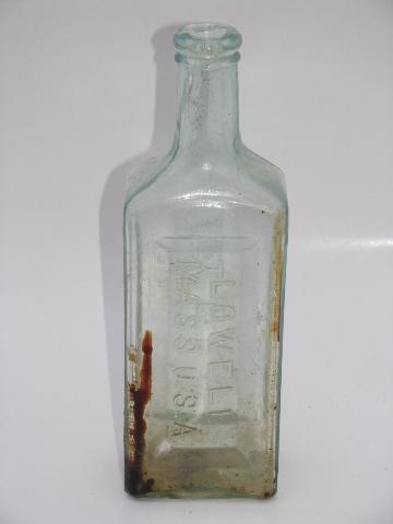 photo of old embossed glass Seely's and Ayer's Sarsaparilla tonic medicine bottles #4