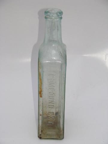 photo of old embossed glass Seely's and Ayer's Sarsaparilla tonic medicine bottles #7