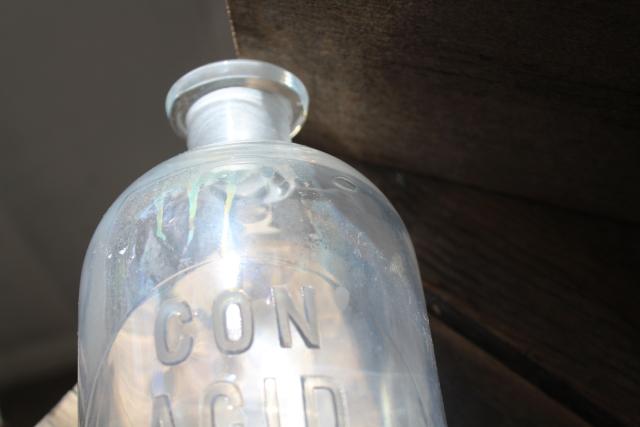 photo of old embossed glass bottles, antique apothecary pharmacy chemical bottle vintage lab glass #2