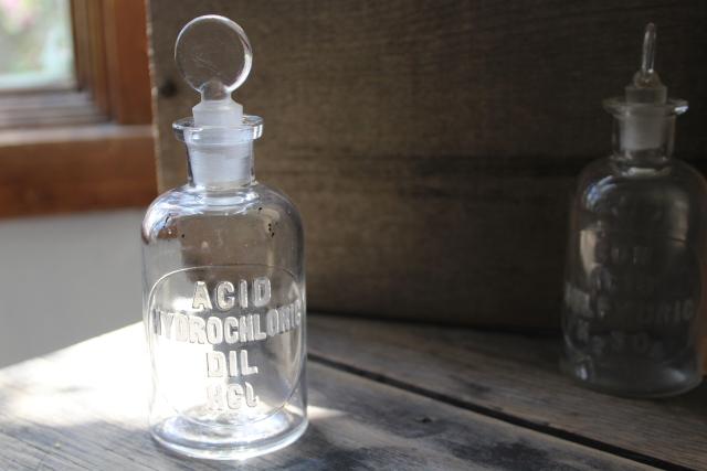 photo of old embossed glass bottles, antique apothecary pharmacy chemical bottle vintage lab glass #5