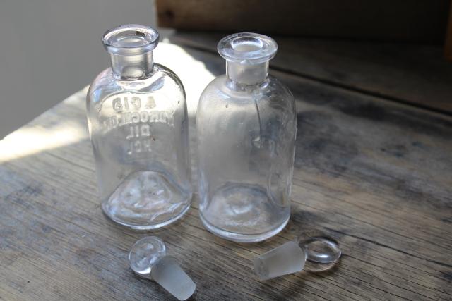 photo of old embossed glass bottles, antique apothecary pharmacy chemical bottle vintage lab glass #8