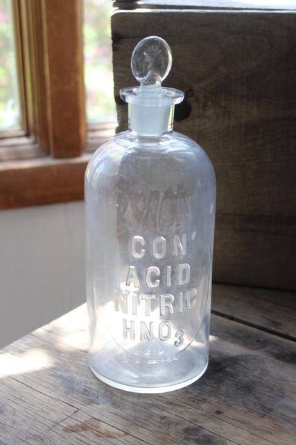 photo of old embossed glass bottles, antique apothecary pharmacy chemical bottle vintage lab glass #10