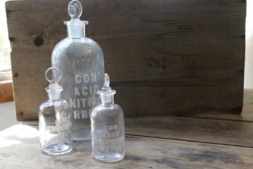 catalog photo of old embossed glass bottles, antique apothecary pharmacy chemical bottle vintage lab glass