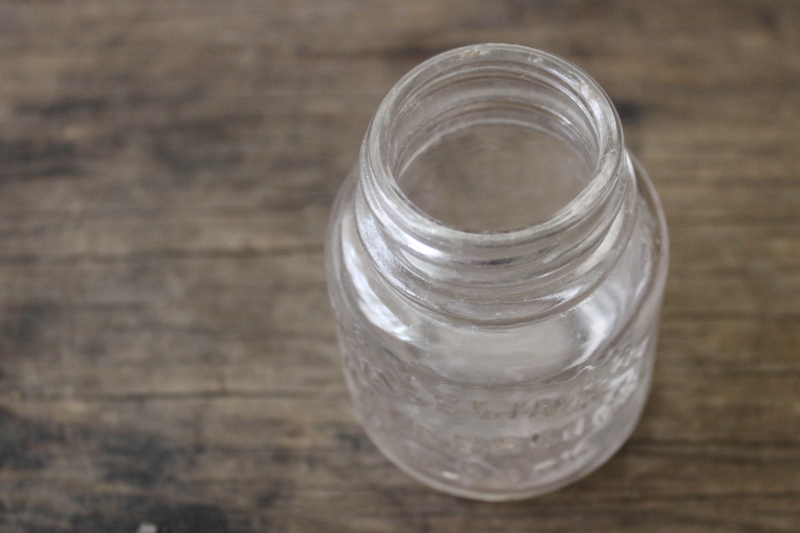 photo of old embossed glass medicine bottle trademark Vaseline jar vintage advertising #4