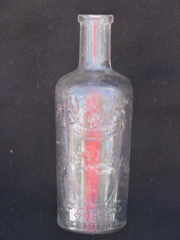 photo of old embossed glass medicine or perfume bottle, E D Pinaud - Paris #1