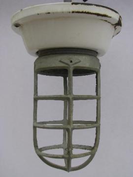 catalog photo of old enamel fixture cage light, huge vintage industrial lighting lamp