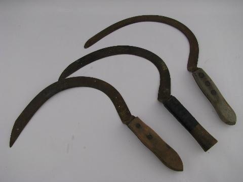 photo of old farm tools, lot of vintage corn knives, sickle cutter blades #1