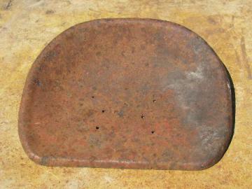 catalog photo of old farm toy riding pedal tractor part, vintage metal seat