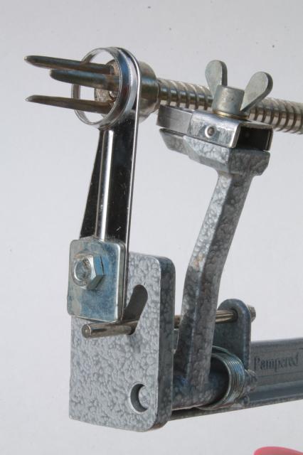 photo of old fashioned metal hand-crank apple peeler or potato peeler #2