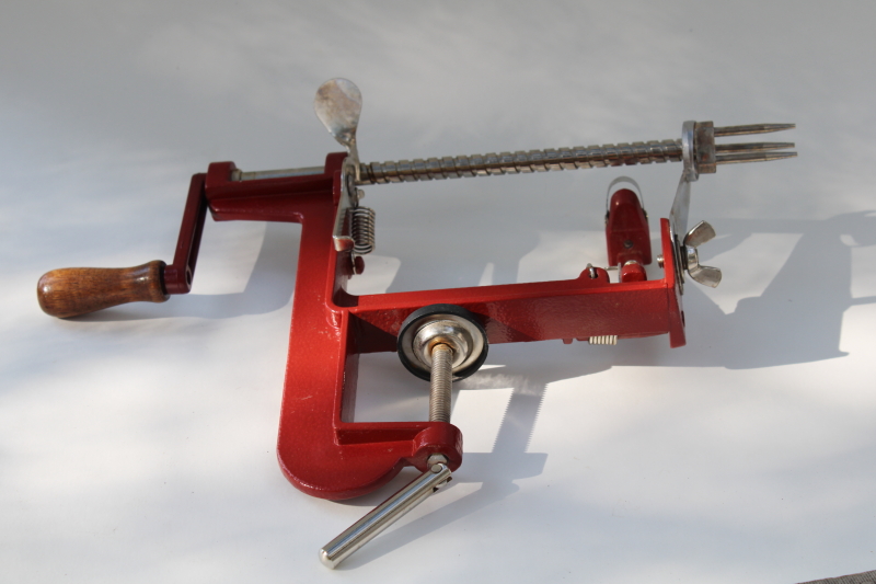 photo of old fashioned red metal hand crank apple peeler, vintage style kitchen tool #3