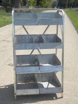 catalog photo of old galvanized metal parts rack, free standing shelf w/ storage bins