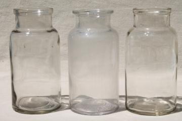 catalog photo of old glass apothecary bottles, vintage clear glass jars lot, bottle canisters or vases