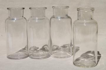 catalog photo of old glass apothecary bottles, vintage clear glass jars lot, bottle canisters or vases