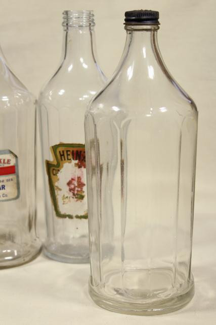 photo of old glass bottles, large vinegar bottle lot w/ some original paper labels #15