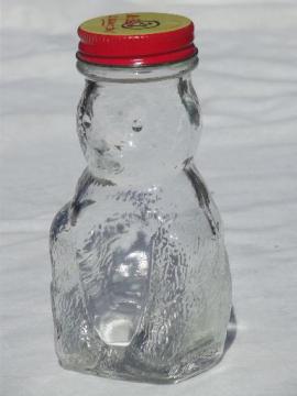 catalog photo of old glass honey bear jar, figural bottle savings bank / candy container