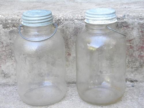 photo of old glass honey jars w/metal caps and wire handles for pantry storage #1