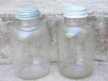 catalog photo of old glass honey jars w/metal caps and wire handles for pantry storage