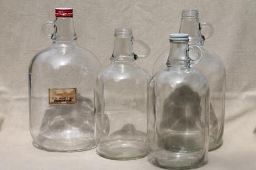 photo of old glass jugs, gallon & half-gallon jug bottles one w/ coca-cola syrup label #1