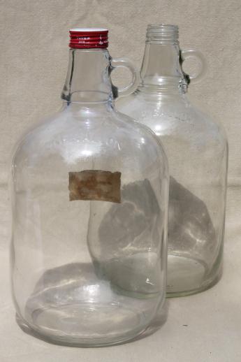 photo of old glass jugs, gallon & half-gallon jug bottles one w/ coca-cola syrup label #4