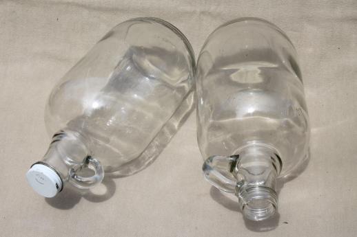 photo of old glass jugs, gallon & half-gallon jug bottles one w/ coca-cola syrup label #9