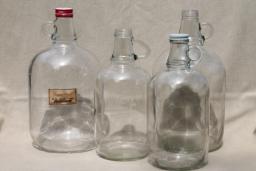 catalog photo of old glass jugs, gallon & half-gallon jug bottles one w/ coca-cola syrup label