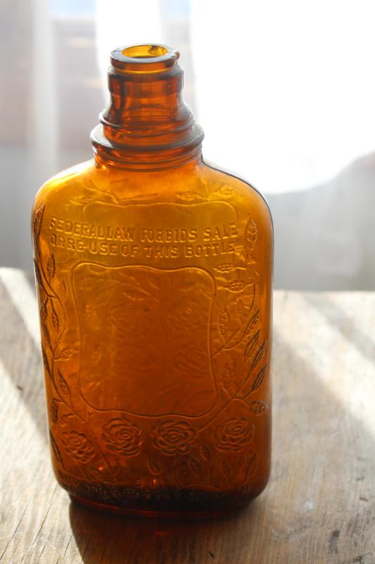 photo of old glass liquor bottles, fancy embossed pattern glass wine & whiskey bottle flasks #3