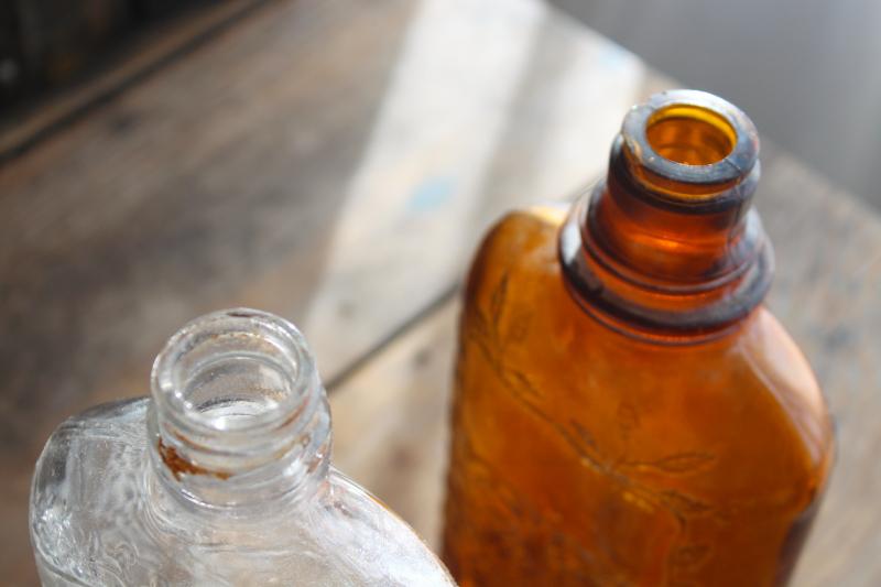 photo of old glass liquor bottles, fancy embossed pattern glass wine & whiskey bottle flasks #6