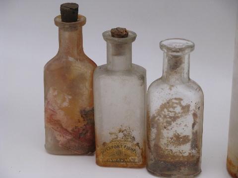 photo of old glass medicine bottle lot, antique vintage bottles as found #3