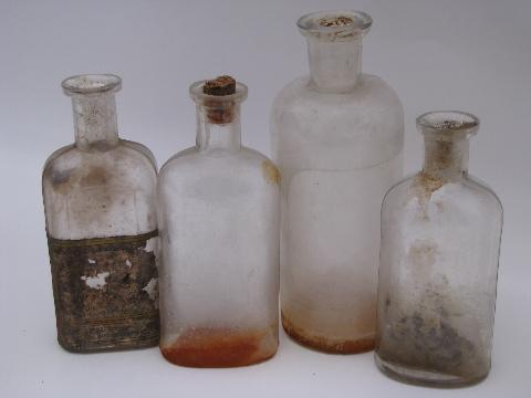 photo of old glass medicine bottle lot, antique vintage bottles as found #7