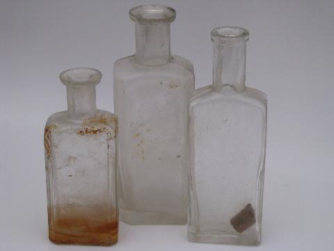 photo of old glass medicine bottle lot, antique vintage bottles as found #10