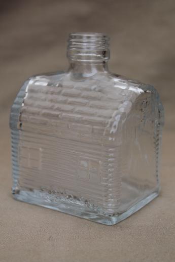 photo of old glass syrup bottle, barn or cabin house figural glass bottle #1