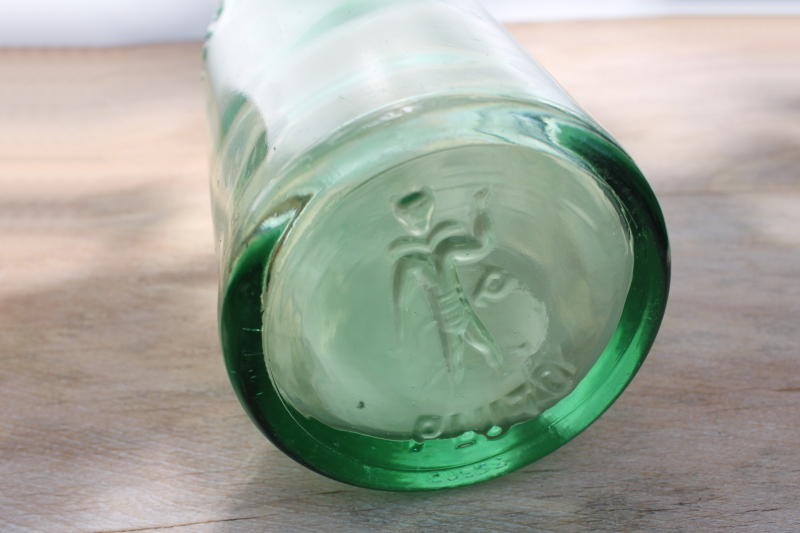 photo of old green glass bottle embossed devil Pluto tonic water vintage quack medicine #2