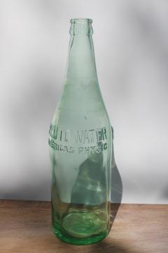 catalog photo of old green glass bottle embossed devil Pluto tonic water vintage quack medicine