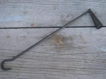 catalog photo of old hand forged wrought iron candle snuffer, long handle for chandelier