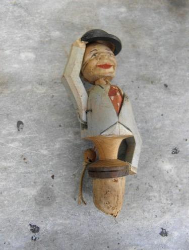 photo of old hand-carved vintage wood bottle stopper, Appenzell man tipping hat #1