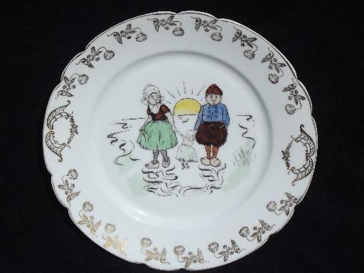 photo of old hand-painted Delft china plate, Dutch boy and girl w/ a doll #1