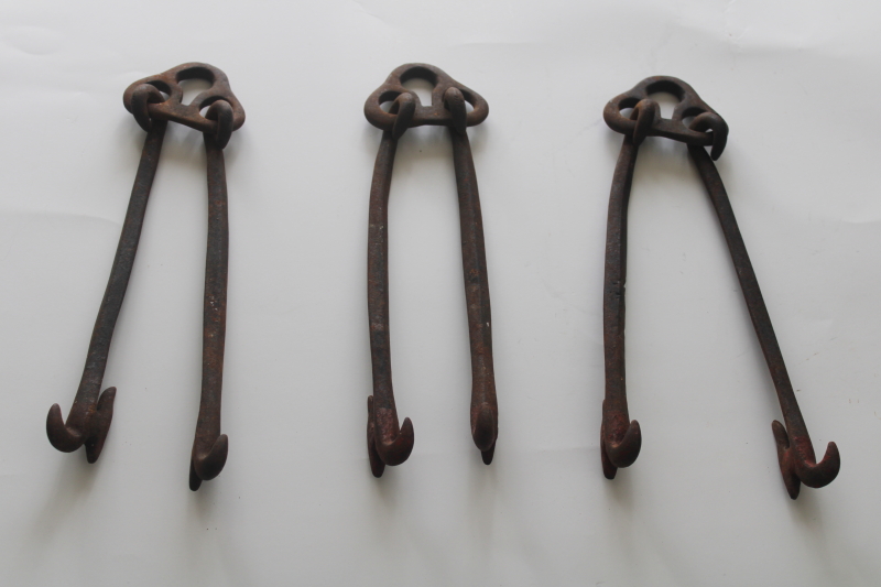 photo of old harpoon shape wrought iron hooks double hangers, antique vintage farm tool or implement hardware  #1