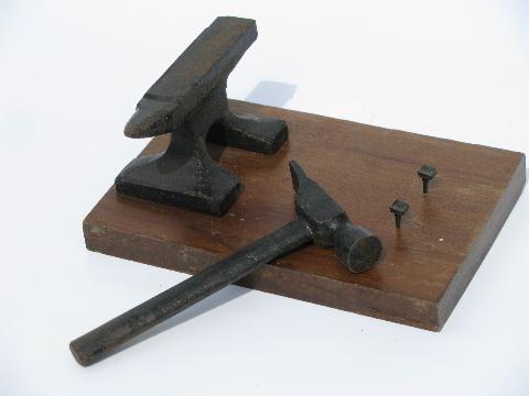 photo of old iron anvil and small hammer, vintage nut cracker #2