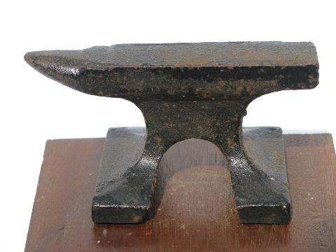 photo of old iron anvil and small hammer, vintage nut cracker #4