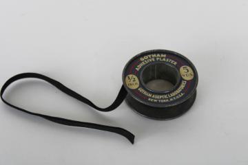 old metal spool from Gotham Labs sticking plaster bandage roll, vintage medical advertising