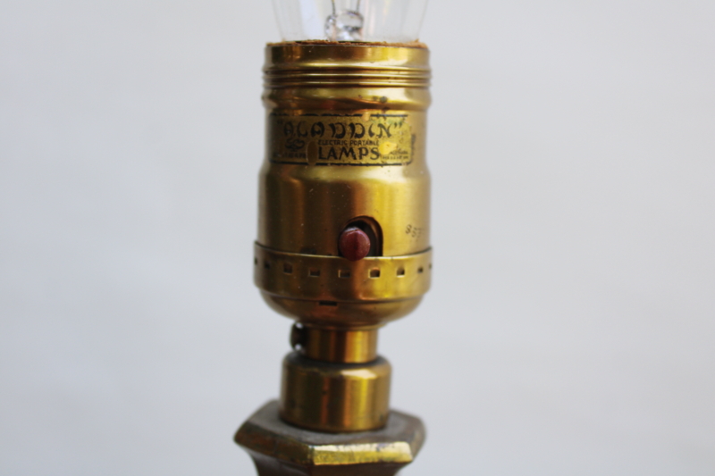photo of old ornate cast metal candlestick lamp w/ antique brass finish, early electric Aladdin label light #2