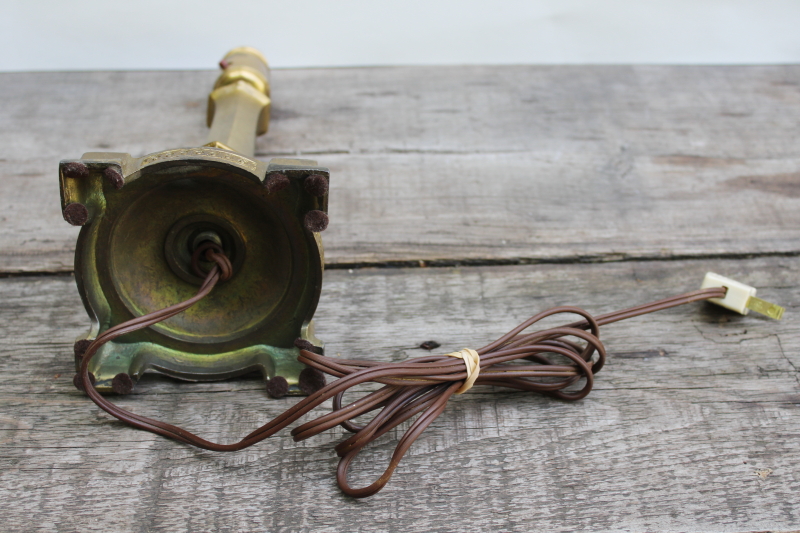 photo of old ornate cast metal candlestick lamp w/ antique brass finish, early electric Aladdin label light #6