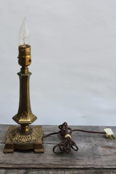 catalog photo of old ornate cast metal candlestick lamp w/ antique brass finish, early electric Aladdin label light 