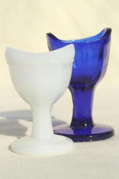 catalog photo of old pharmacy vintage glass eye wash cups, cobalt blue & milk glass 