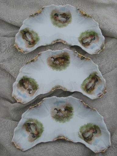 photo of old porcelain crescent plates bone dishes w/ game birds, grouse and ducks #1